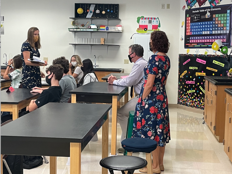 Superintendent Bob Fulton and Board of Education President Alison Myers sit in on Kathleen Fisher’s science class. SUBMITTED PHOTO